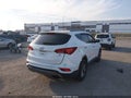 2017 Hyundai Santa Fe — photo 4 of 15 | VIN 5XYZU3LBXHG420350
