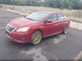 2014 Nissan Sentra — photo 2 of 10 | VIN 3N1AB7AP3EL637612