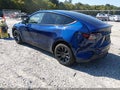 2023 Tesla Model Y — photo 3 of 15 | VIN 7SAYGDEE9PF708420