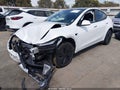 2026 Tesla Model Y — photo 2 of 20 | VIN 7SAYGDED1TA609072