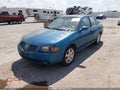 2004 Nissan Sentra — photo 2 of 11 | VIN 3N1AB51D24L731358