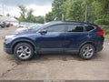 2017 Honda CR-V — photo 14 of 16 | VIN 2HKRW2H89HH611574