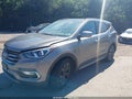 2017 Hyundai Santa Fe — photo 2 of 17 | VIN 5XYZWDLA6HG423284