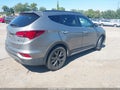 2017 Hyundai Santa Fe — photo 4 of 17 | VIN 5XYZWDLA6HG423284
