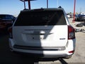 2014 Jeep Compass — photo 16 of 16 | VIN 1C4NJCEA6ED674594