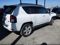 2014 Jeep Compass — photo 4 of 16 | VIN 1C4NJCEA6ED674594