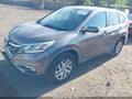 2016 Honda CR-V — photo 2 of 16 | VIN 5J6RM4H56GL008996