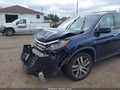 2018 Honda Pilot — photo 6 of 17 | VIN 5FNYF6H91JB057348