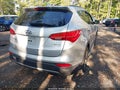 2014 Hyundai Santa Fe — photo 4 of 17 | VIN 5XYZU3LB6EG222828
