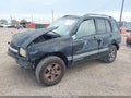2003 Chevrolet Tracker — photo 2 of 17 | VIN 2CNBE13C236943410