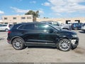 2015 Lincoln MKC — photo 13 of 16 | VIN 5LMCJ1A96FUJ26547