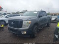 2017 Nissan Titan — photo 2 of 16 | VIN 1N6AA1F33HN506166