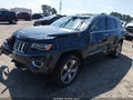 2014 Jeep Grand Cherokee — photo 2 of 14 | VIN 1C4RJECG7EC400833