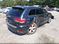2014 Jeep Grand Cherokee — photo 4 of 14 | VIN 1C4RJECG7EC400833