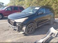 2013 Hyundai Santa Fe — photo 2 of 10 | VIN 5XYZU3LB4DG006071