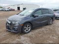 2018 Honda Odyssey — photo 2 of 16 | VIN 5FNRL6H58JB026043