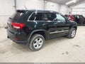 2012 Jeep Grand Cherokee — photo 4 of 11 | VIN 1C4RJFAT0CC260708