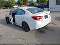 2018 Subaru Impreza — photo 3 of 17 | VIN 4S3GKAA65J3614074