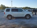2012 Honda Pilot — photo 13 of 16 | VIN 5FNYF3H98CB028284