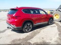 2019 Hyundai Santa Fe — photo 4 of 19 | VIN 5NMS5CAA0KH111881