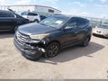 2015 Hyundai Santa Fe — photo 2 of 16 | VIN 5XYZUDLB4FG263532