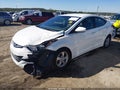 2014 Hyundai Elantra — photo 2 of 16 | VIN 5NPDH4AE1EH494021