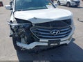 2017 Hyundai Santa Fe — photo 6 of 18 | VIN 5XYZU3LB4HG463680