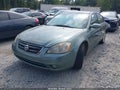 2002 Nissan Altima — photo 2 of 16 | VIN 1N4BL11E92C717374