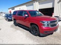2015 Chevrolet Suburban 1500 — photo 1 of 21 | VIN 1GNSKHKC6FR267454