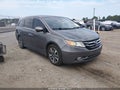 2015 Honda Odyssey — photo 1 of 16 | VIN 5FNRL5H90FB027899
