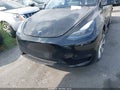 2023 Tesla Model Y — photo 13 of 24 | VIN 7SAYGAEE9PF836834