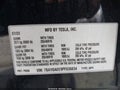 2023 Tesla Model Y — photo 9 of 24 | VIN 7SAYGAEE9PF836834
