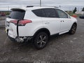 2018 Toyota RAV4 — photo 4 of 16 | VIN 2T3RFREVXJW838919
