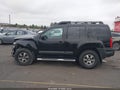 2011 Nissan Xterra — photo 14 of 16 | VIN 5N1AN0NW8BC524125