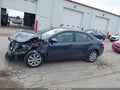 2014 Toyota Corolla — photo 14 of 16 | VIN 5YFBURHE8EP120837