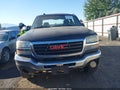 2004 GMC Sierra — photo 13 of 17 | VIN 1GTHK29U44E371699