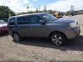 2013 Honda Pilot — photo 12 of 16 | VIN 5FNYF4H5XDB014634