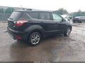 2018 Ford Escape — photo 4 of 17 | VIN 1FMCU9HD1JUA03749