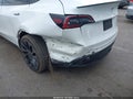 2023 Tesla Model Y — photo 6 of 15 | VIN 7SAYGDEF6PF663669