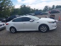 2018 Kia Optima — photo 13 of 17 | VIN 5XXGT4L38JG189631