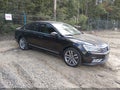 2017 Volkswagen Passat — photo 1 of 17 | VIN 1VWCM7A35HC066926