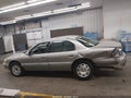 1999 Lincoln Continental — photo 13 of 15 | VIN 1LNHM97V5XY629970