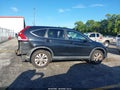 2013 Honda CR-V — photo 13 of 16 | VIN 5J6RM3H51DL027798