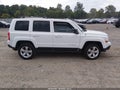 2014 Jeep Patriot — photo 13 of 16 | VIN 1C4NJRCBXED928659
