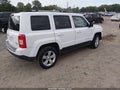 2014 Jeep Patriot — photo 4 of 16 | VIN 1C4NJRCBXED928659