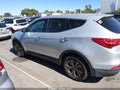 2016 Hyundai Santa Fe — photo 14 of 16 | VIN 5XYZT3LB2GG363112