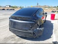 2026 Tesla Model Y — photo 4 of 23 | VIN 7SAYGDED7TF525762