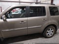 2009 Honda Pilot — photo 14 of 16 | VIN 5FNYF48919B018145