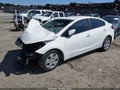 2017 Kia Forte — photo 2 of 15 | VIN 3KPFK4A74HE106591