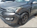 2014 Hyundai Santa Fe — photo 6 of 16 | VIN 5XYZU3LB7EG125542